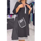 Robe trapèze noire chic pour femme avec bordure contrastante et détails de poche