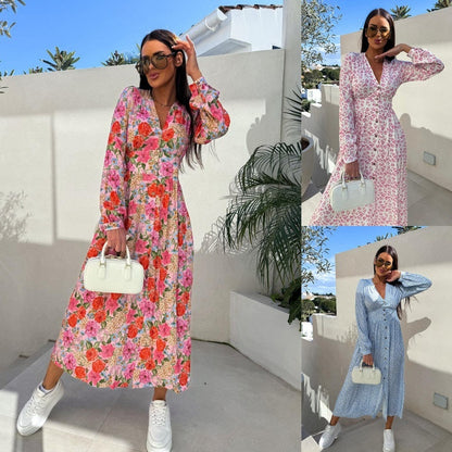 Robe fleurie tendance à manches longues, accentuant la taille, avec col en V et patte de boutonnage