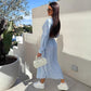 Robe fleurie tendance à manches longues, accentuant la taille, avec col en V et patte de boutonnage