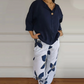 Ensemble haut ras du cou et pantalon imprimé pour femme