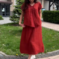 Robe ample et unie avec col en V et volants sur le devant