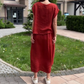 Robe ample et unie avec col en V et volants sur le devant